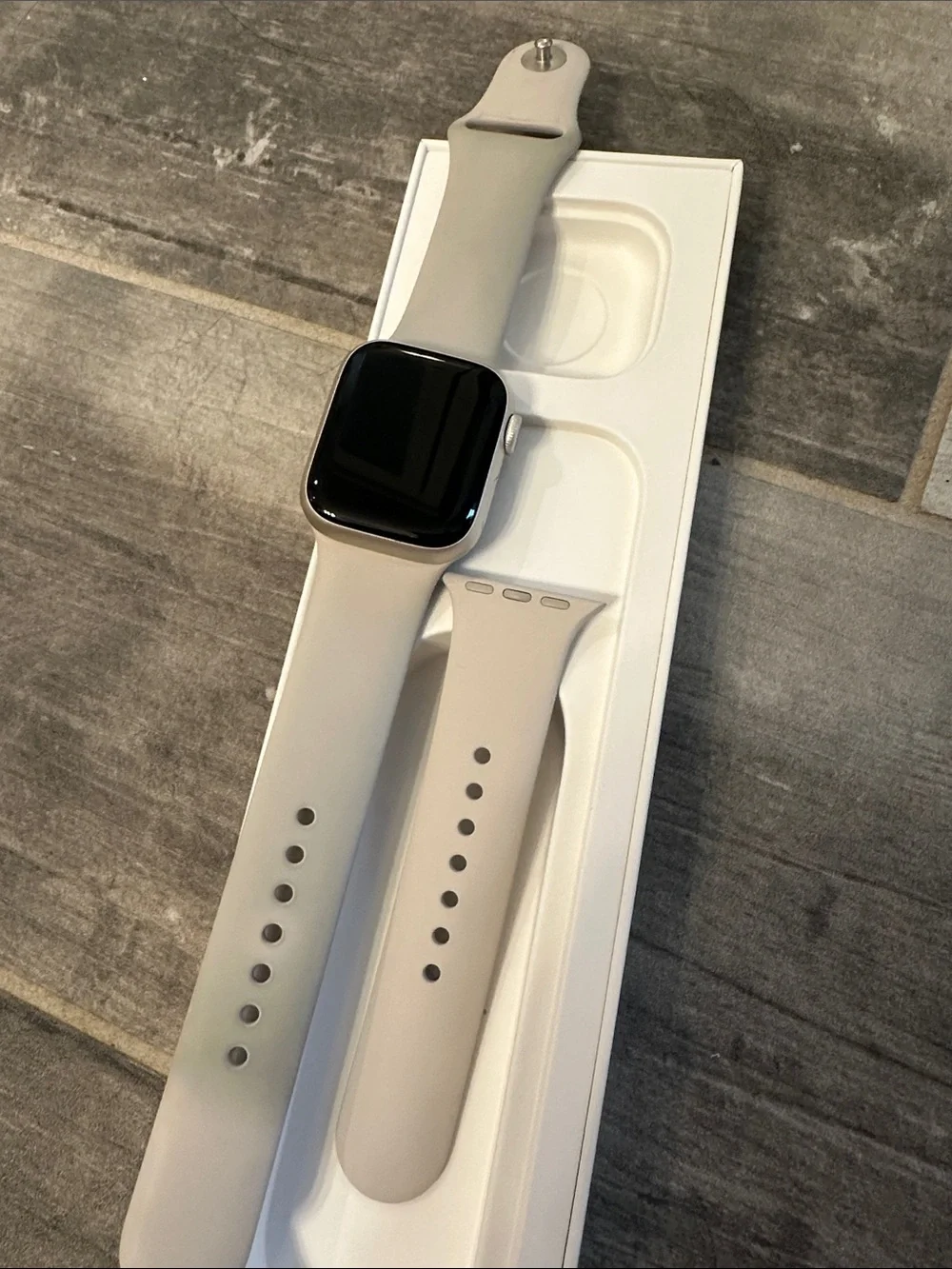 Apple Watch in Light Gray Silicone with Black Display